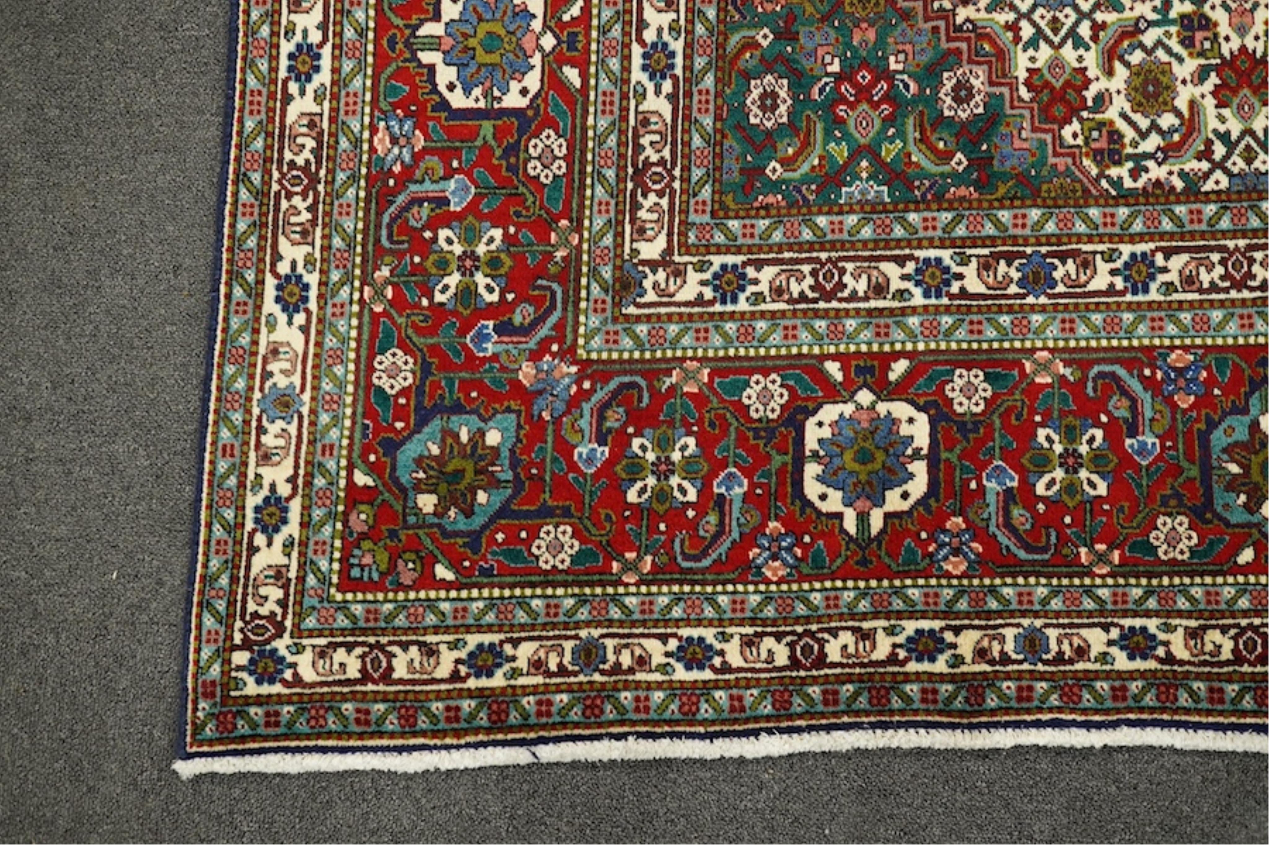 A Tabriz carpet, 300 x 204cm. Condition - good